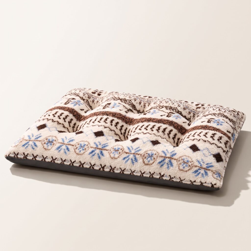 Cream plush pet mat with a brown and blue Fair Isle pattern